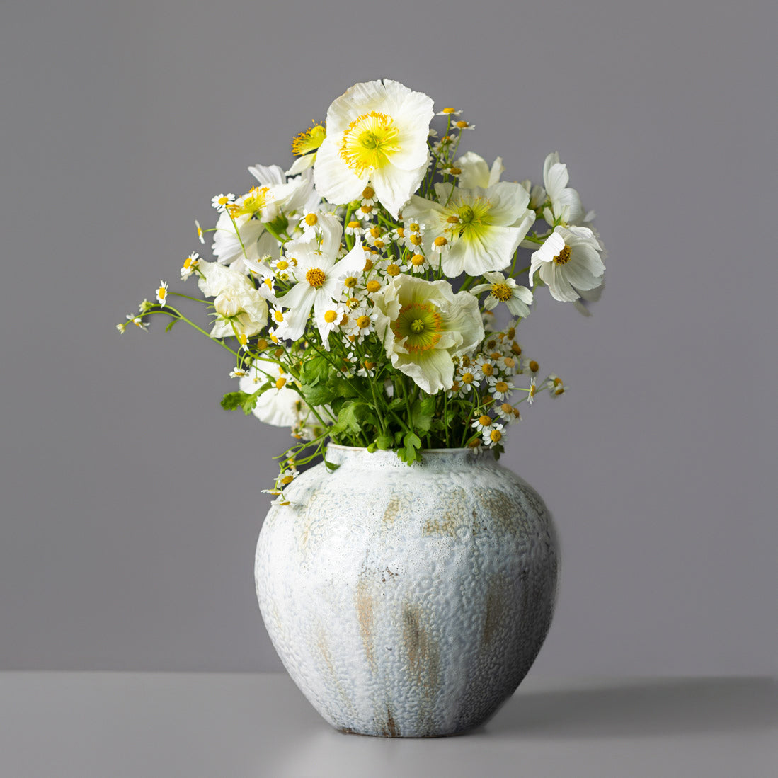 White Poppies in Urn